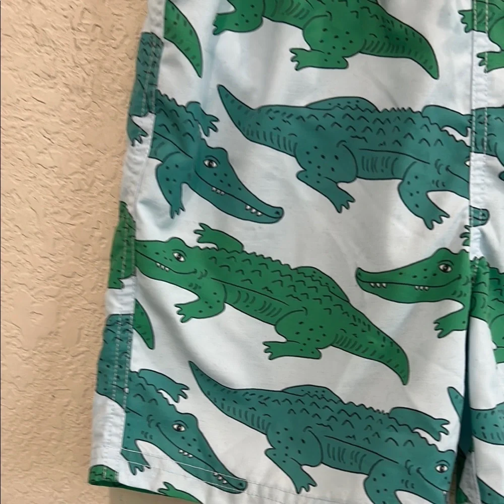 Mini BodenKids Swim Trunks with Green Alligator Print 8-9y
